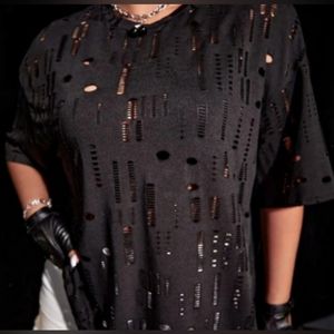 COPY - Fun black shirt with holes. Add a colorful tank underneath for a super c…